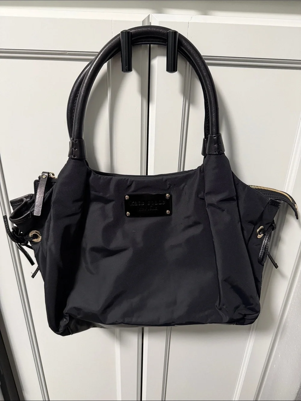 kate spade Black Nylon Shoulder Bag with Gold-Tone Plaque & Polka Dot Lining